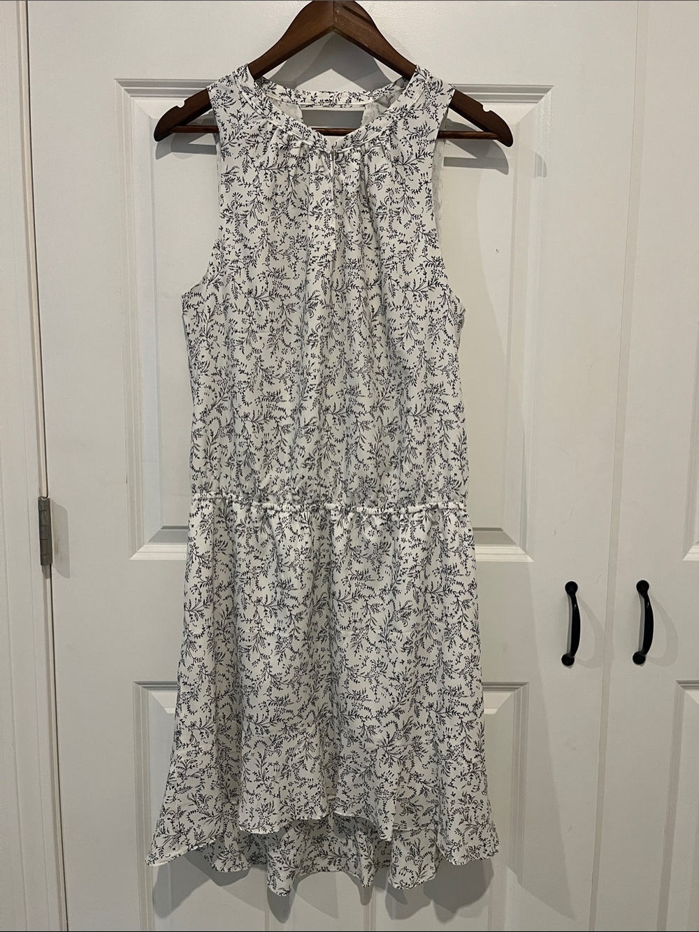 Sleeveless White and Black Floral Dress with Slight Longer Hem in Back